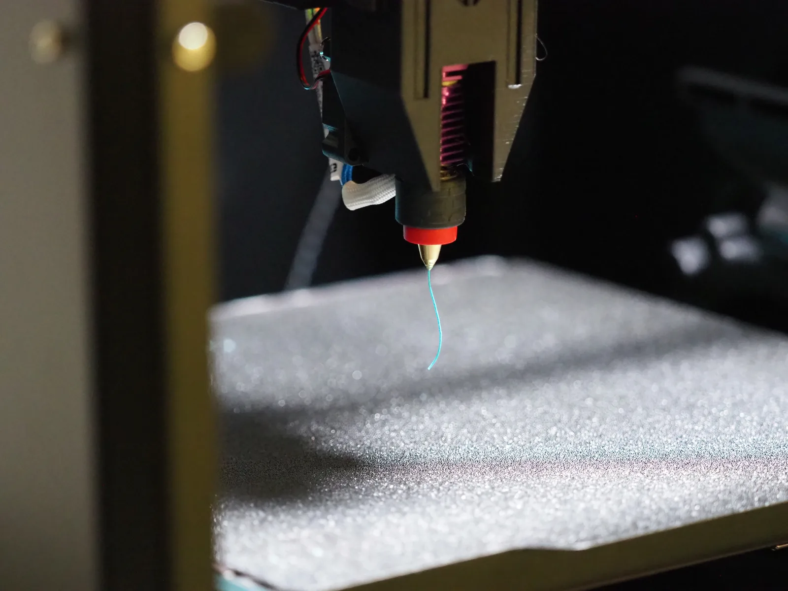 Filament oozing from the Melta MK1 hotend nozzle
